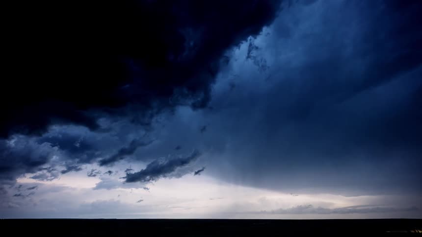 The black clouds move over the field