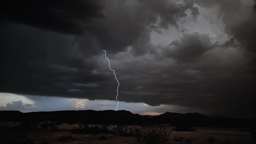 Lightning flashes in the dark clouds
