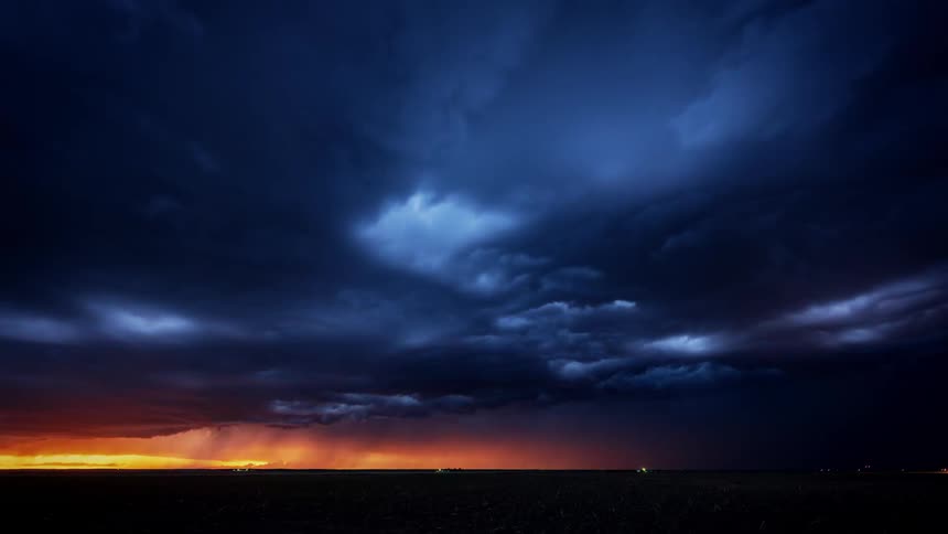Clouds roll over head and lightning flickers