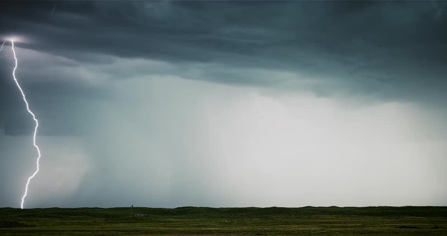 Lightning flashes in the dark sky