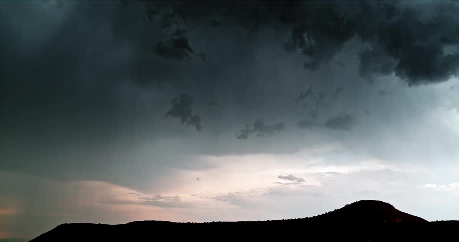 Lightning streaks across cloudy sky