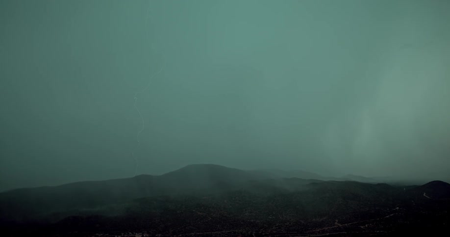The foggy range has lightning shooting inside