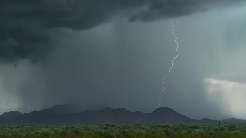 Lightning flashes in the dark sky