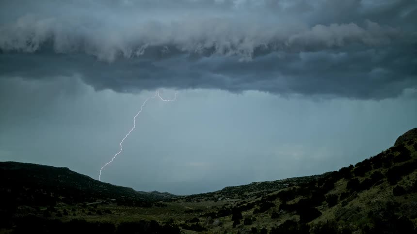 Lightning flashes in the dark sky