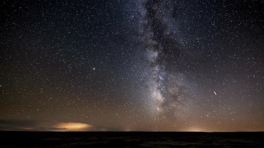 Stars shoot through the night sky