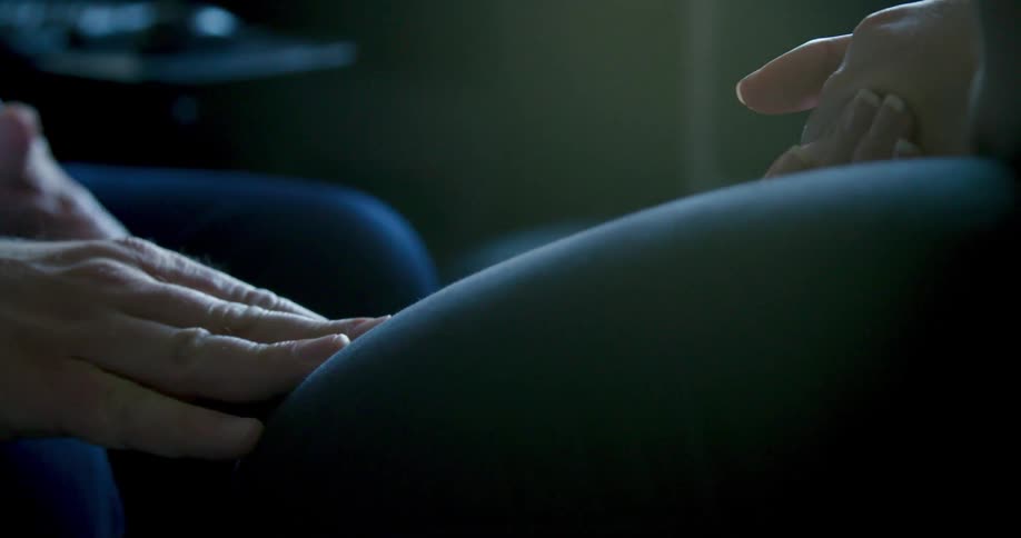 Hand reaches out with a comforting touch