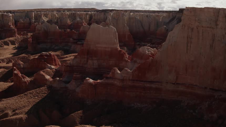 The clouds flow over the canyon
