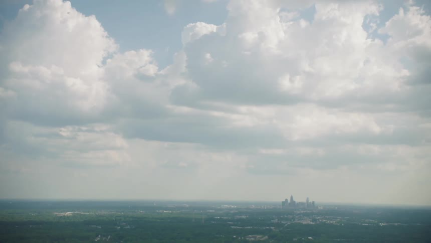 Heavy clouds are high above the city ahead