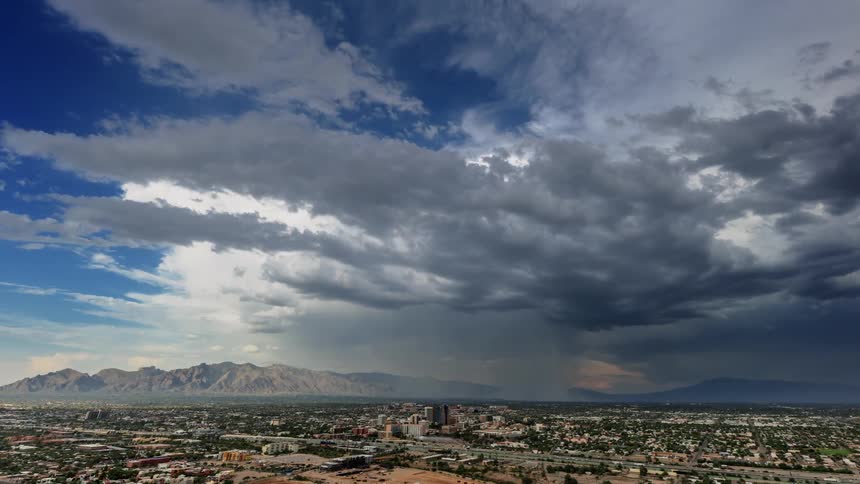 Storm clouds float over a city