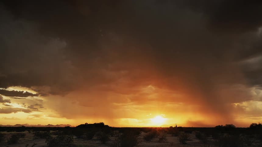 Grey clouds pass above the plains