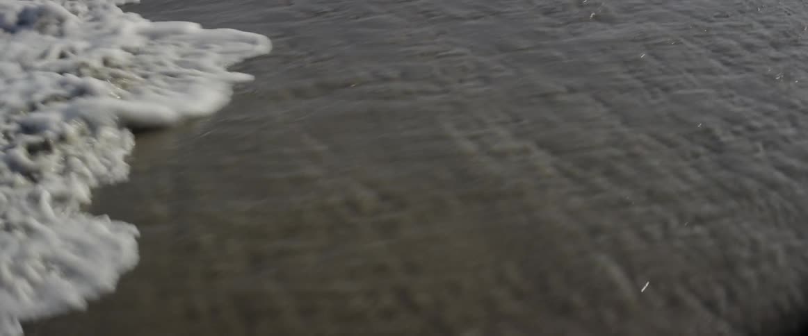 Waves in dark ocean water