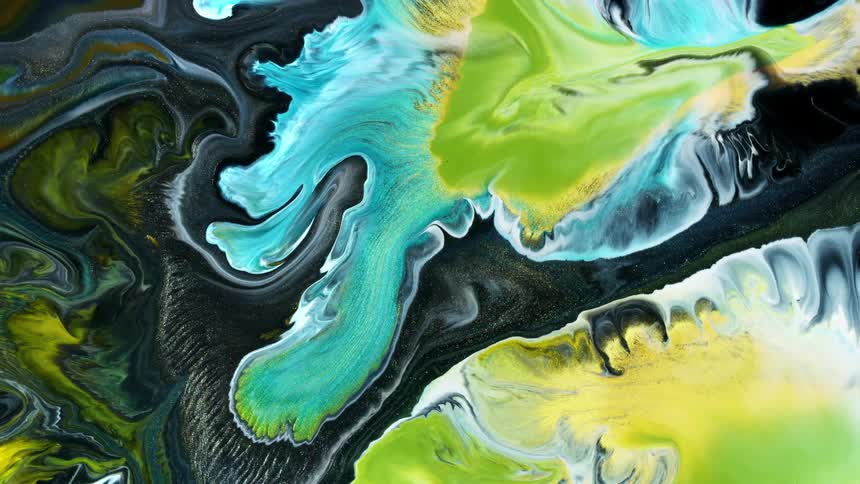 Different colors of liquid swirl together