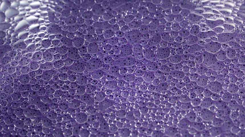 Purple liquid bubbles and pops