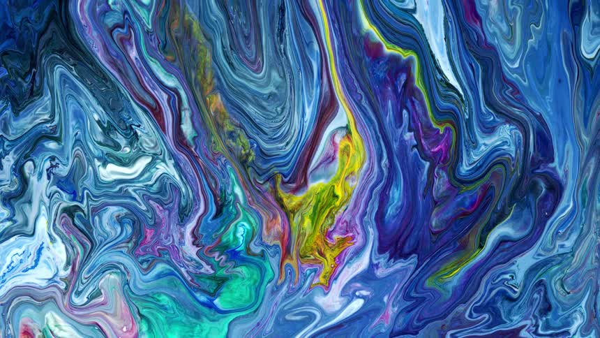 Multi colored liquid gently swirls around