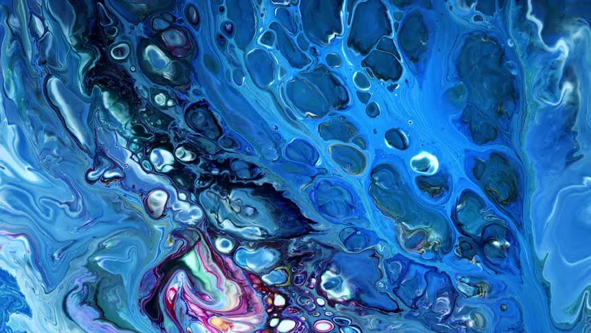 The paint moves and mixes together causing bubbles