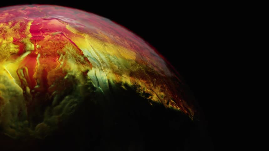 Lights shine on a colorful sphere
