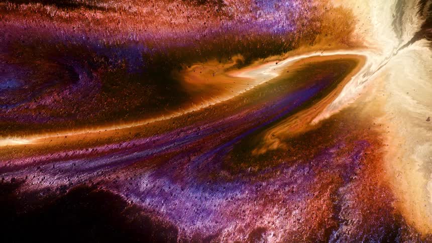 Colorful paint swirls and flows