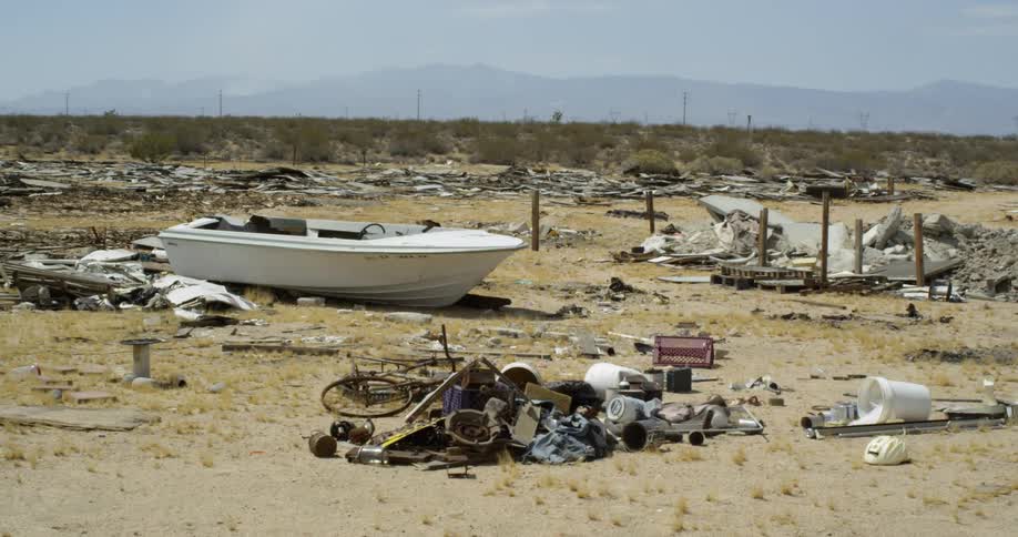 Junk lies in a rural field