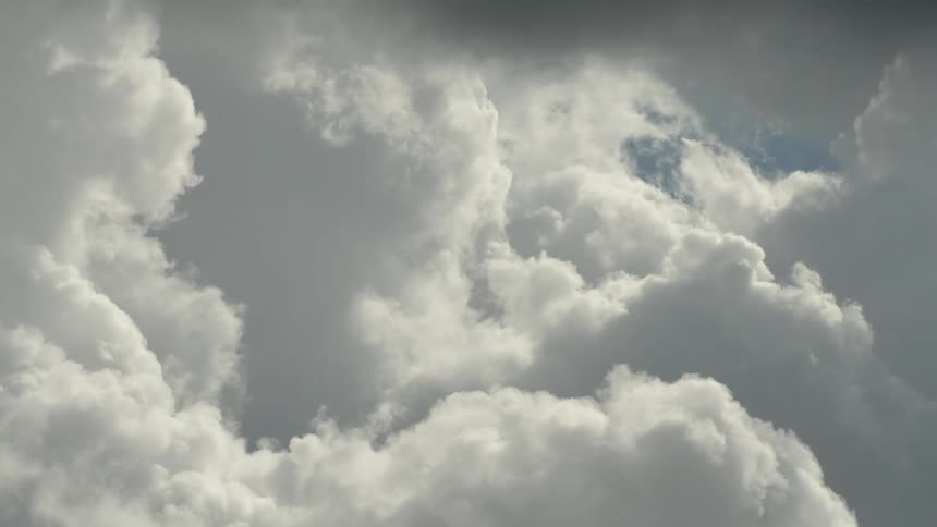 Heavy white clouds fill the skyline
