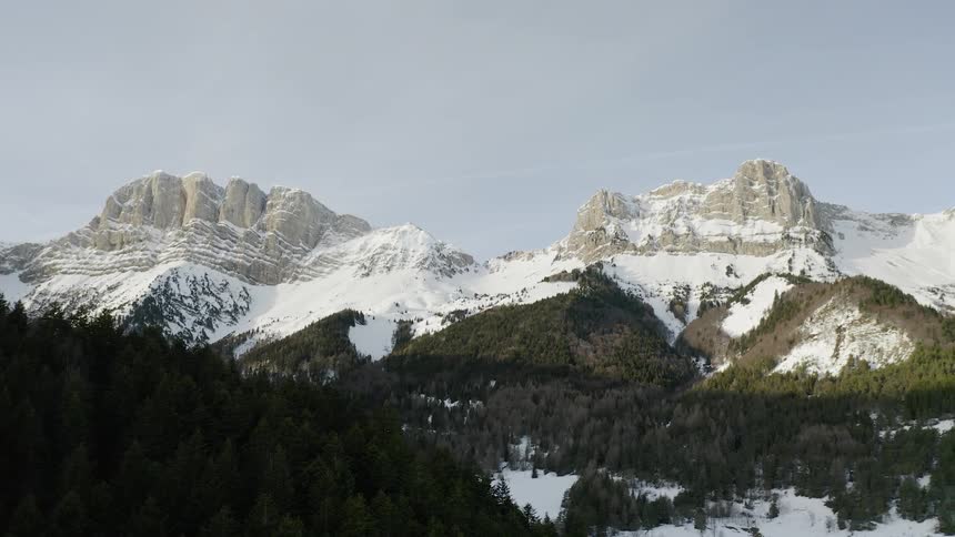 The vast mountain range is covered with snow