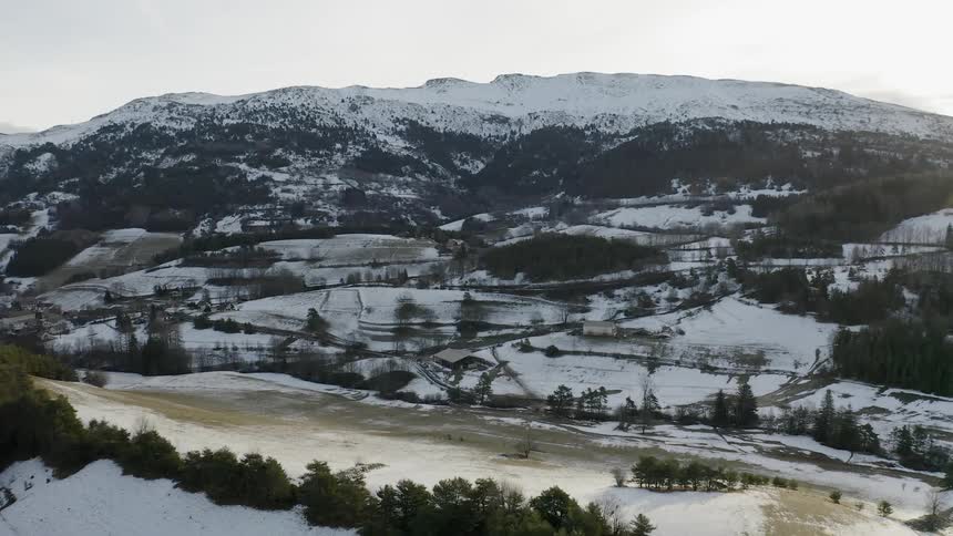 A snow covered valley