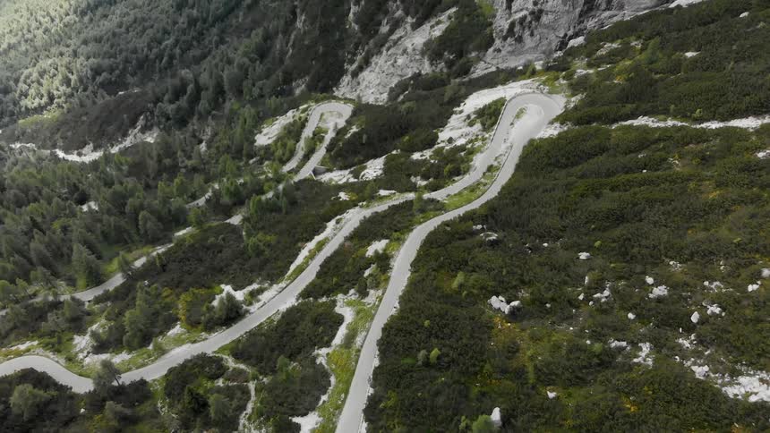 A road winds up a mountainside