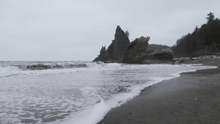 Ocean waves roll into the shore