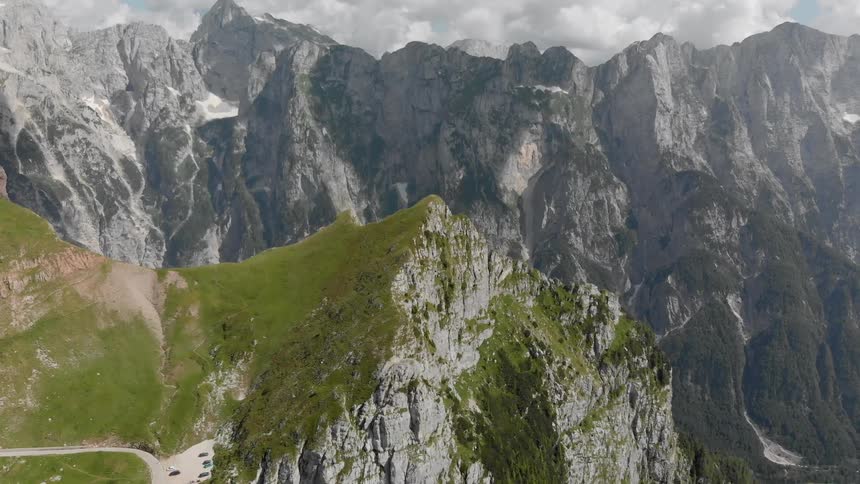 Clouds float over a mountain range