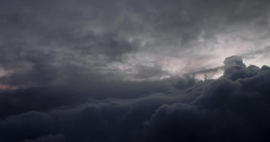 Clouds floating overhead at sunset