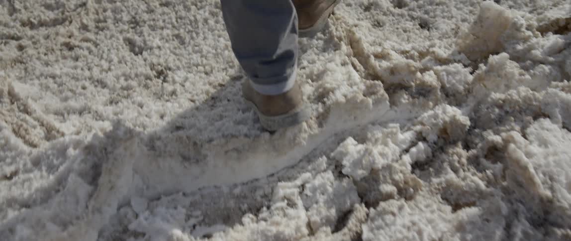 A man walks on snow