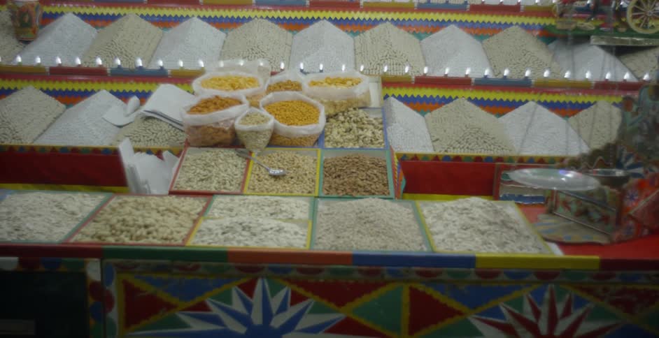 Spices are set up for sale at a market