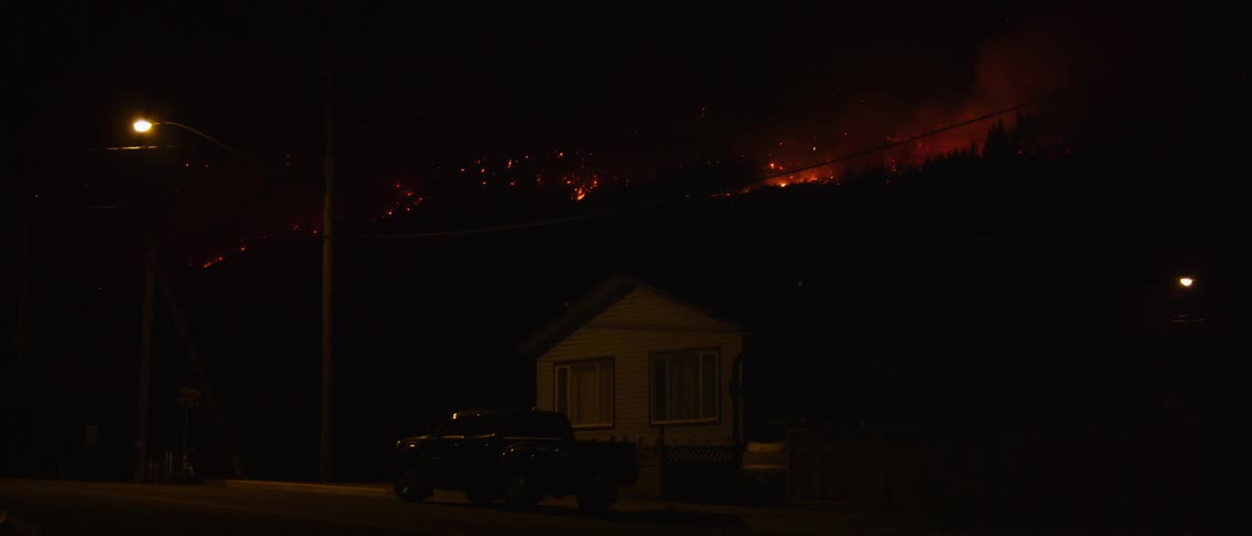 A fire burns on the mountain