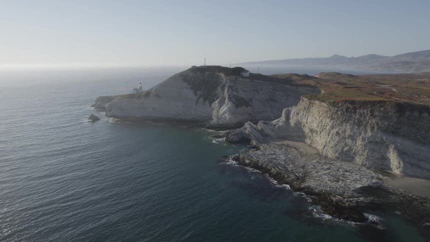 A rocky jagged cliff side