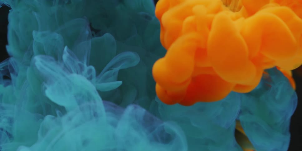 Blue and orange fills up the volume of clear liquid
