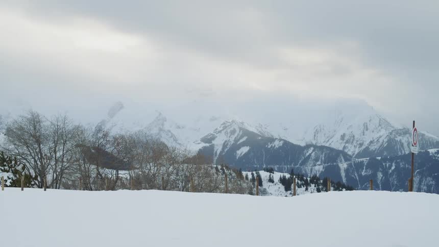 Snow covers the mountain landscape