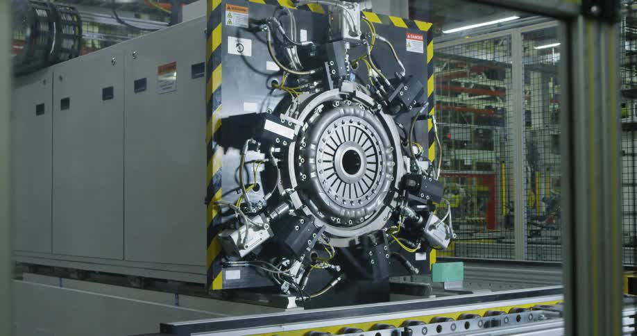 Machinery sits in a factory in an enclosed area