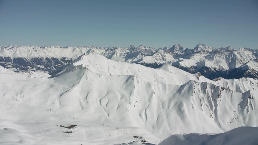 Snow covers the mountain landscape