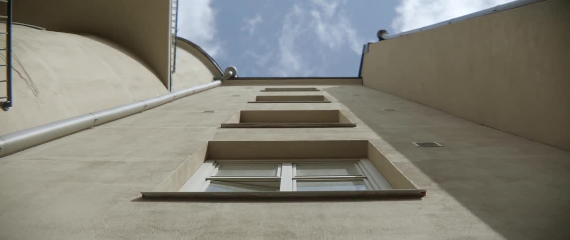 Minimalist architecture lines create a unique perspective look at a city apartment facade