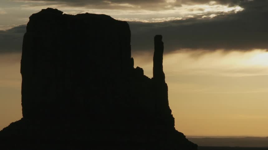 Time lapse of a small rock cliff on a cloudy day