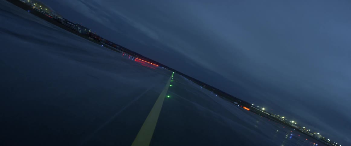 Lights shine on a runway at night