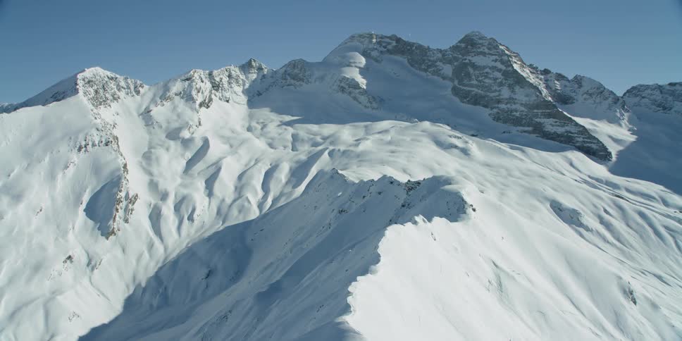 Snow covers the mountain landscape