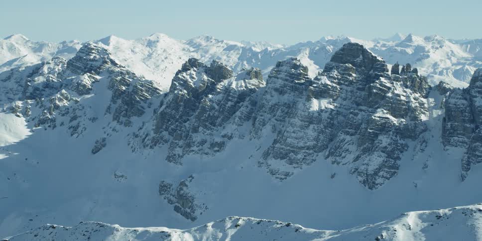 The mountains are covered with ice and snow