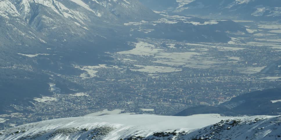 Sun shines down on snowy mountains