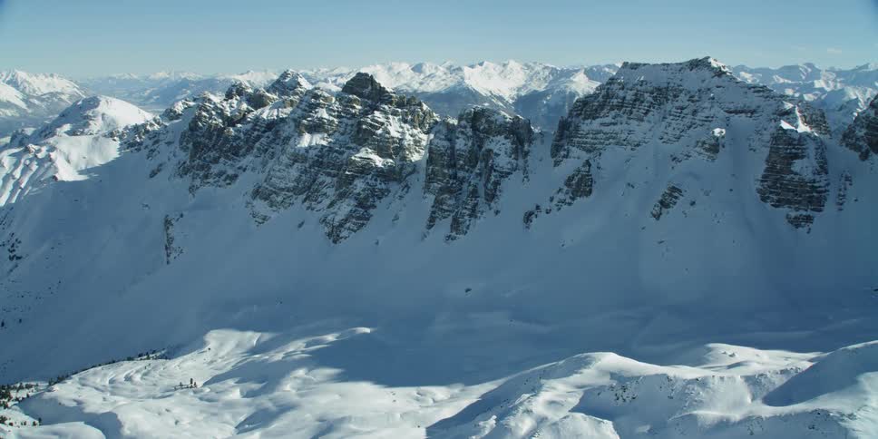 Snow covers the mountain landscape