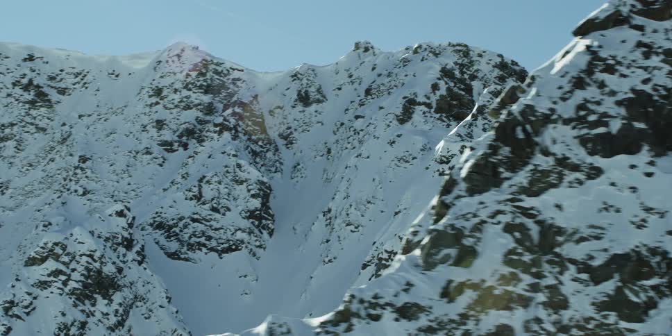 Snow covers the mountain landscape
