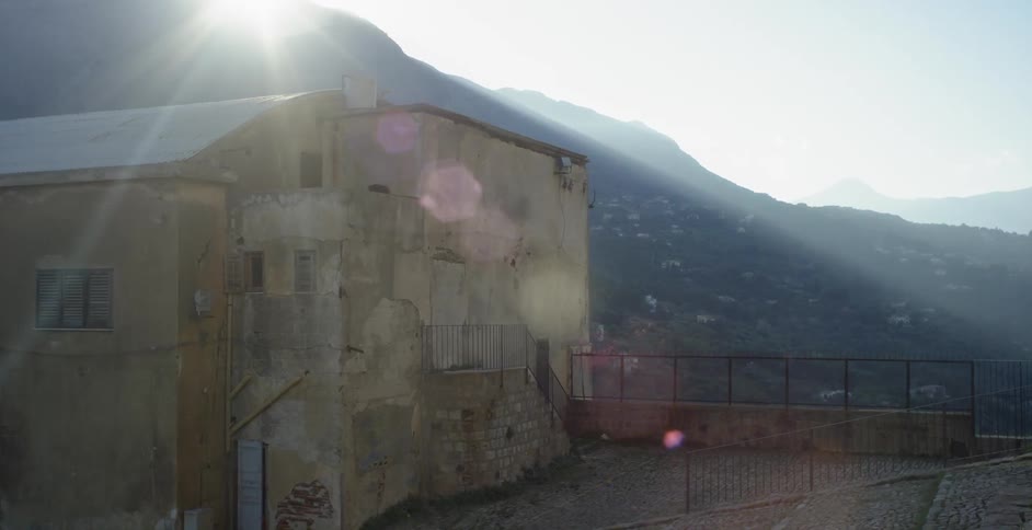 The stone building is on the mountain side