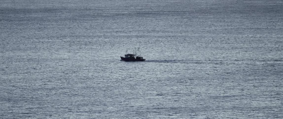 A boat travelling over water
