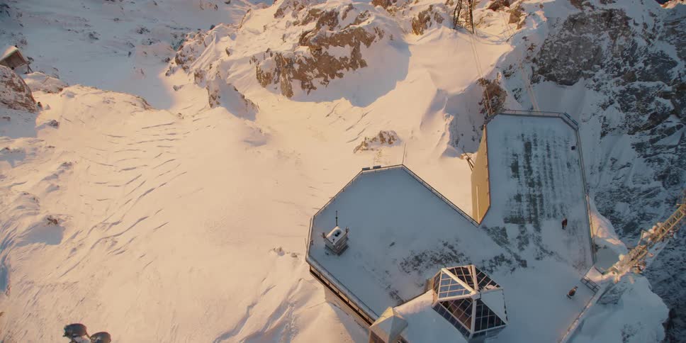 The mountain has a building on the top