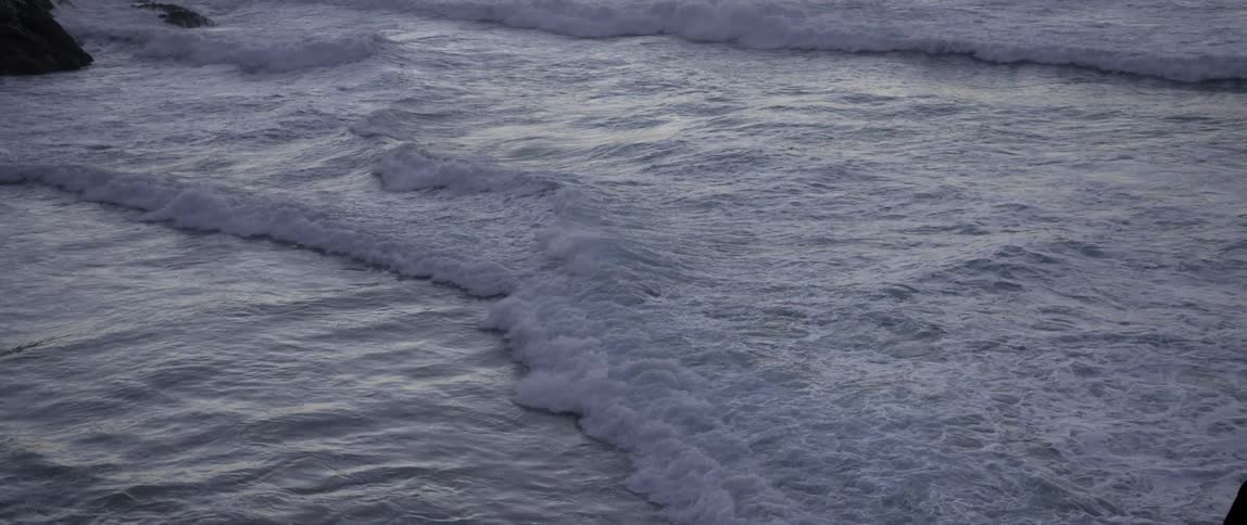 Waves wash up from the ocean