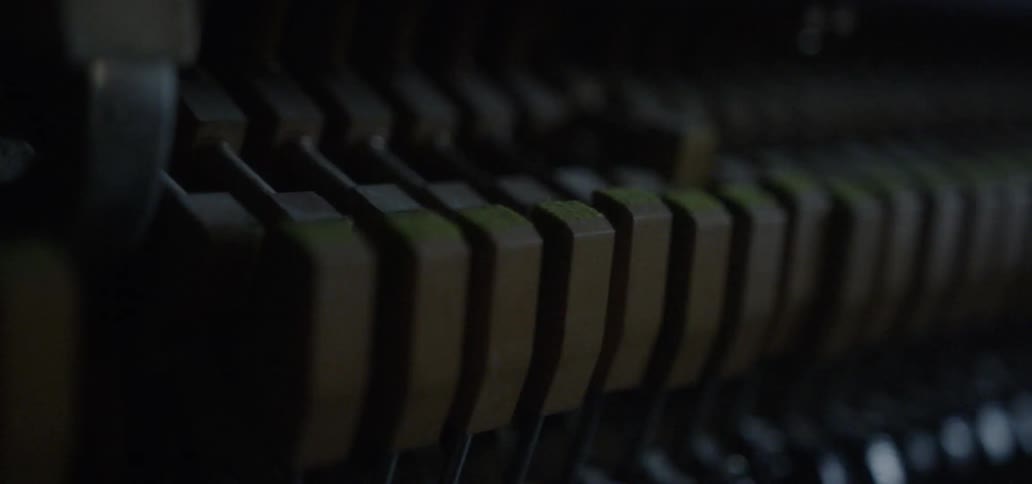 Piano hammers move up and down